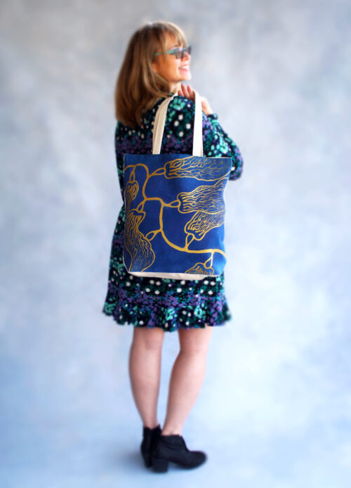 seaweed gold and navy artsy tote in use